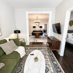 Gothic-meets-mid-century 2BR in Lakeview | Statement Kitchen + Dining for 4