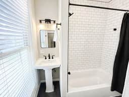 Gothic-meets-mid-century 2BR in Lakeview | Statement Kitchen + Dining for 4
